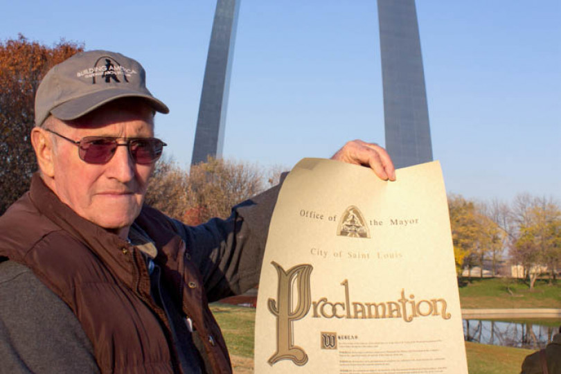 Archie Brittain displays the proclamation issued by St. Louis Mayor Francis Slay naming November 15 “Gateway Arch Boilermaker Craftsmen Day.