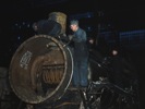 Working on the boiler of a locomotive at the 40th street shop of the Chicago and North Western Railway Company, Chicago, 1942