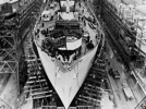 A liberty ship nears completion; on the twenty-fourth day the ship will be ready for launching, Bethlehem Fairfield Shipyards, Baltimore, Maryland, 1943