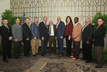 Rep. Sander Levin (D-MI 9th), center, with IVP-NE Larry McManamon, fifth from left; IR Dan Luhmann, third from left; IR Don Hamric, far right; and the delegation from L-169. 
