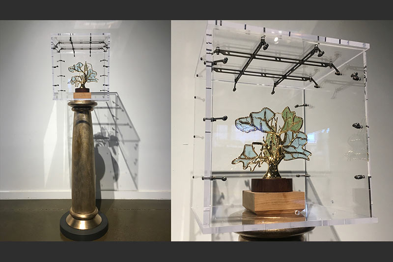 Charles Jones designed this custom case and Tuscan column inspired base for the Cattolica award presented to Bank of Labor for producing “Lobstermen,” a video by Wide Awake Films.