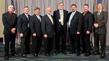 SEN. JEFF MERKLEY (D-OR), fourth from right, with l. to r., Mark Keffeler, L-242; IR Gary Powers; IVP D. David Haggerty; IP Newton Jones; IVP J. Tom Baca; Fred Rumsey, L-242; and Sheldon Murray, L-104.