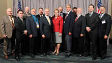 REP. MARCY KAPTUR, (D-OH-9th), center, with the Ohio delegation and IP Newton Jones, sixth from left; IVP Larry McManamon, fifth from right; IST Bill Creeden, third from right; IR Don Hamric, second from left; and IR Len Gunderson, fifth from left.