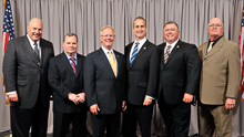 REP. MARIO DIAZ-BALART (D-FL-25th), third from right, with, l. to. r., Ed Smith, Ullico; IVP Warren Fairley; IP Newton Jones; James Barnes, L-433; and Tim Collins, L-433.
