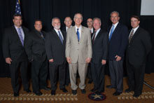 Rep. Bill Foster (D-IL 11th), center, with (l. to r.) Glenn Reinhardt, L-483; Kirk Cooper, L-60; IST Bill Creeden; IR Bill Staggs; IR Dwain Burnham; IP Newton Jones; IVP Larry McManamon; and IR Tony Palmisano.