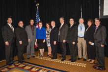 REP. MARCY KAPTUR (D-OH 9th), fourth from left, with IP Newton Jones, center; IVP Larry McManamon, seventh from left; D-GA-PLD Cecile Conroy, fifth from left; IR-ISO Dwain Burnham, fourth from right; and members of the Ohio delegation.