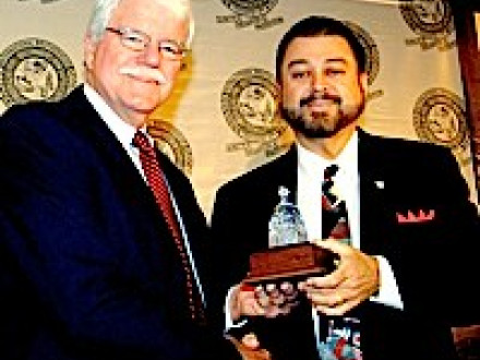 Rep. George Miller, l., accepts the 2007 Legislator of the Year award from IVP Tom Baca.