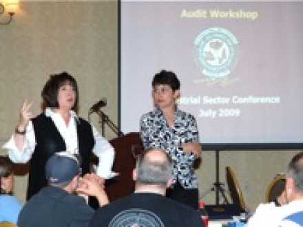 Jackie Judy, AD/ISO, left, and Tara LaGree, AS/IST, conduct an audit workshop for lodge trustees at the first annual Industrial Sector conference in Kansas City last year.