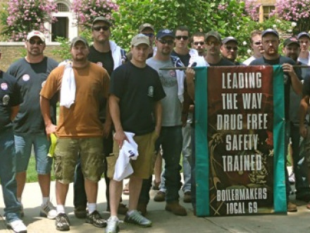 Apprentices and apprentice instructors from L-69 and other area lodges take part in a march in Little Rock, Ark., for the Employee Free Choice Act. Behind them is Little Rock High School, site of an infamous civil rights incident in 1957 in which the state’s governor kept black students from entering the then all-white school.