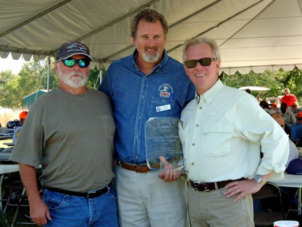 IP Newton Jones, r., and IST Bill Creeden, l., accept an award on behalf of the Boilermakers union for hosting the 2nd annual Kansas City area USA clays shoot Oct. 1. Presenting the award is USA Executive Director Fred Myers.