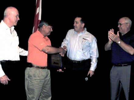 IVP Dave Haggerty, second from left, is congratulated for his NMAPC service by, l. to r., Bob Hoover of  Kvaerner North America Construction and NMAPC Management Co-Chair; Steve Lindauer, NMAPC CEO and Impartial Secretary; and SAIP Tony Jacobs, the Boilermakers’ Director of National Construction Agreements. 