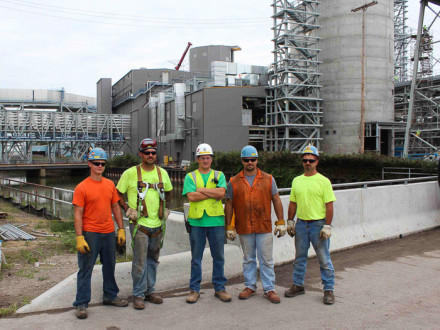Local 169 members (l-r) Branden Dormire, Chris Larose, Kevin Mackenzie, Ben Ryers and Brian Smith pause near the lime prep and byproducts disposal area, part of the new spray dry absorber system. Photos by Marty Mulcahy, The Building Tradesman