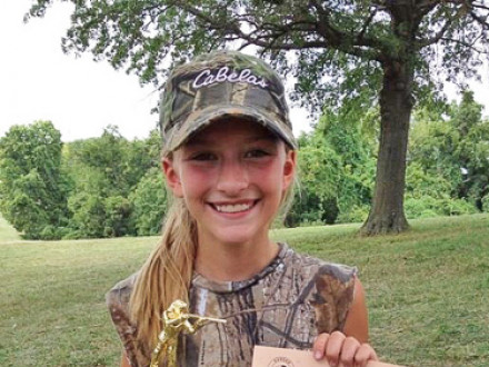 Evie Turney shows off her bull’s-eyes.