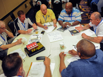 Members practice handling a grievance during a breakout session led by Ruth Needleman of the National Labor College.