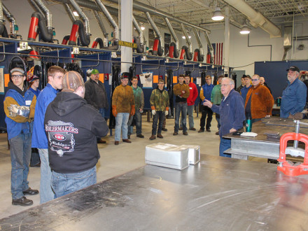 Retired L-169 instructor Jim Howard addresses participants in the lodge’s annual welding contest for high school students.