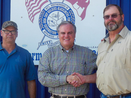 L-69 LEAP committee chairman Richard Rowley, left, and L-69 BM-ST Rodney Allison, right, meet with U.S. Sen. Mark Pryor.