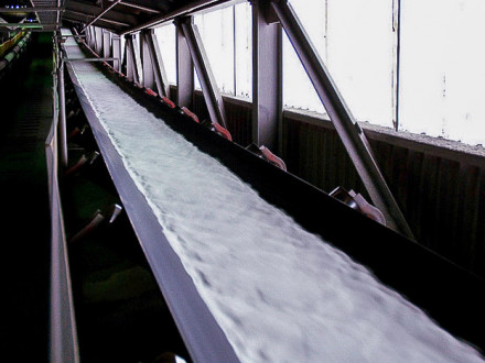 Alumina travels by conveyor at a Canadian aluminum plant.  Copyright © 2014 Rio Tinto	