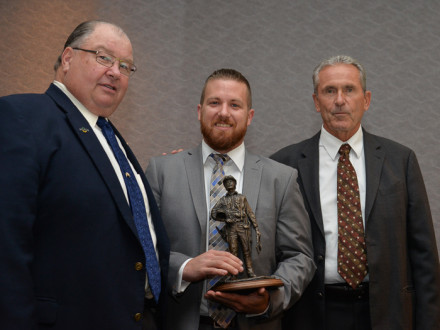 L-169’s Jonathon Nevedal accepts the first place award as top graduate apprentice for 2015 from BNAP National Coordinator Marty Spencer, left, and IVP Larry McManamon (Secretary, National Joint Apprenticeship Board).
