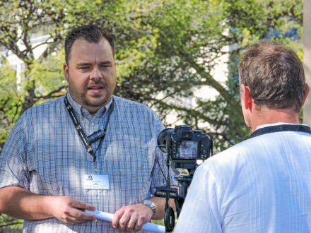 Tyler Brown, COS/ED-ISO, gives an interview during a global cement conference in Hyeres, France, Oct. 17-19.