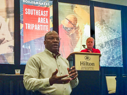 TVA Senior Program Manager for Industrial Relations Jerry Payton speaks about the Boilermaker Code during a presentation by MOST National Administrator Skipper Branscum (background).