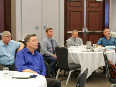 Canadian business managers listen as presenters at a training in Toronto prepare them for their new lodge responsibilities.