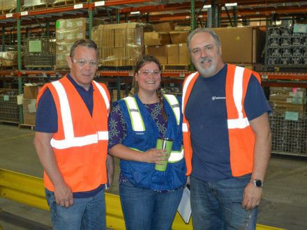 IR Dan Luhmann, left, tours the Attwood facility with Human Resources Manager Jamie Orr and L-M7 President Mark Babcock.