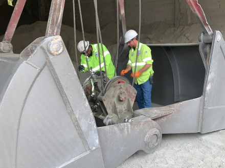  L-D23’s Terris Deans, left, and Daniel Jones repair crane cables at the Cemex plant in Clinchfield, Georgia. Both Deans and Jones are in college through the plant’s college education program.