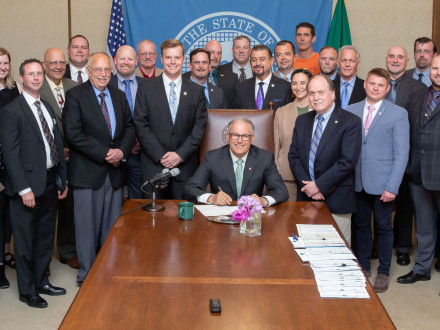Washington Gov. Jay Inslee signed ESHB 1817 into law on May 8, 2019. Attending the signing were State Rep. Mike Sells, primary sponsor of the bill and chair of the Committee on Labor and Workplace Standards. Also attending were state senators Rebecca Saldaña, Jesse Salomon and Steve Conway; Washington State AFL-CIO President Larry Brown; WBCTD Legislative Director Neil Hartman; WBCTD Executive Secretary Mark Riker and Luke Esser, government affairs. The Western States Boilermakers attending were IVP-WS J. T