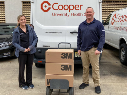 John Lacovara, L-28, delivers three cases of N-95 masks to Cooper Hospital in Camden, New Jersey, where his daughter Lauren Lacovara (pictured) works.