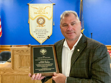 John Bland, BM-ST of Local 13, receives the John F. Erickson NACBE Safety Award on behalf of his lodge.