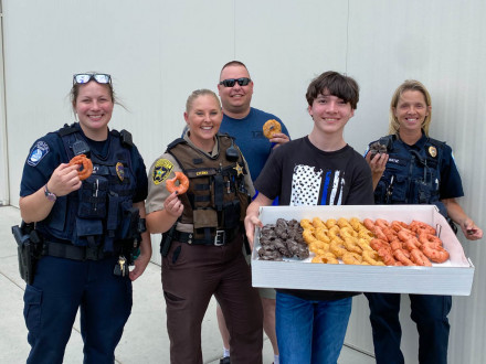 Tyler Carach makes Donut Delivery to police officers.