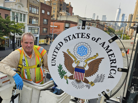 Frank Kotnik, L-5, designed, fabricated and installed the brackets for all the signs along the Avenue of the Americas.