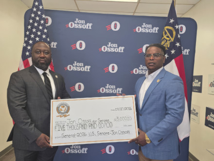 Carlos Brooks and Edwin Allen Jr. presented Senator Jon Ossoff with a $5,000 reelection campaign contribution on behalf of the Boilermakers union.