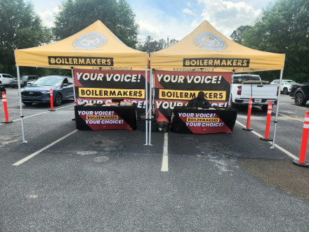 Carlos Brooks stays ready to answer questions in the parking lot.