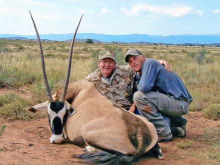 Local 13 (Philadelphia) retiree and former lodge president Jim Delsordo, left, with a gemsbok taken in South Africa in 2007.