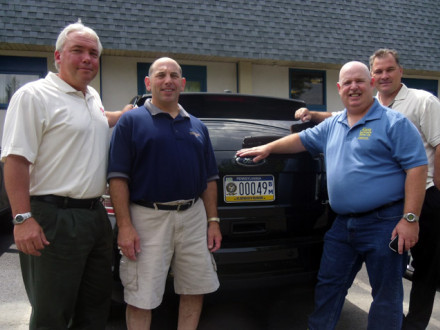 Members of L-13 proudly display the new custom license plate available to Boilermakers and their family members residing in Pennsylvania. Left to right, John Clark, BM-ST; Mike Impagliazzo, president; Tom Green, scholarship fund chairman; and John Bland, scholarship fund trustee and business agent. Also serving as scholarship fund trustees (not pictured) are Dan Drumm, Scott Werkheiser, and Steve Raleigh.
