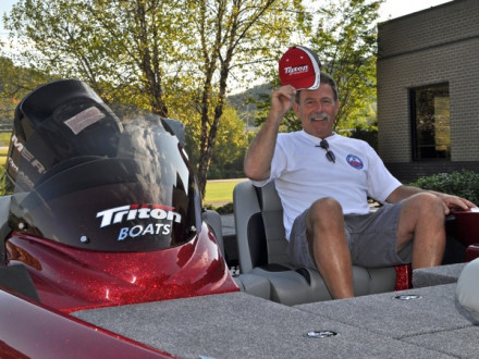Tim Smith sits in the new Triton TR-18 bass boat he won through his membership with the Union Sportsmen’s Alliance. 