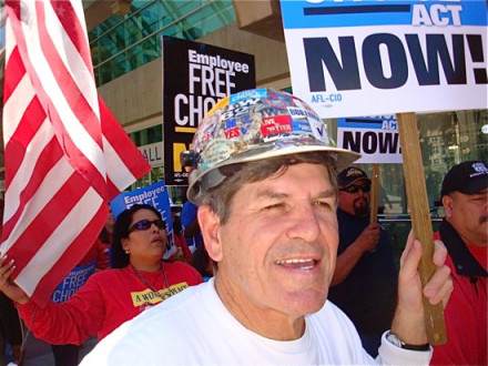 Boilermakers from Local 1998, San Diego (NASSCO Shipyard), take part in a Cesar Chavez Day march. L. to r., Diana Barrientos, office manager; Kenny Johnston, chief steward for the steel bargaining unit; and (background) Robert Navarro, chief steward for the crane operators.