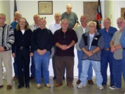 Members of Local 26 (Savannah, Ga.) receive their membership pins at the October 2009 local lodge monthly meeting.