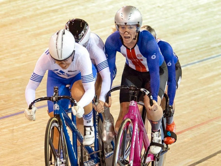 Paige Gray and Stephanie Zundel (tandem cycle on right) work their way up the pack at the UCI Para-cycling Track World Championships in Milton, Ontario. Gray is a control room operator at Black Hills Power in Pueblo, Colorado, and L-101 sponsors the racing duo.