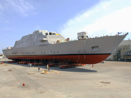 LCS 7 is rolled out of the assembly building for additional work prior to launch.