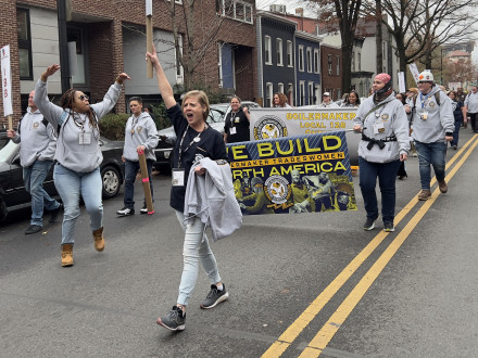 Boilermaker women bring spirit, breaking through the dreary D.C. drizzle at the TWBN banner parade.