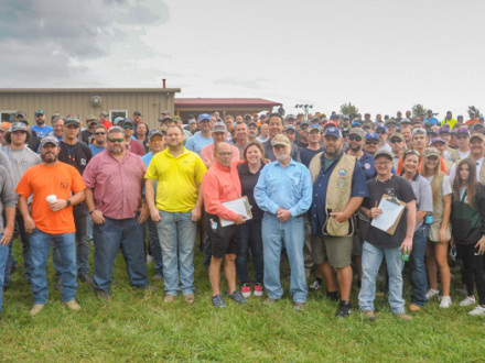 The massive crowd at the 11th annual USA Boilermakers Kansas City Sporting Clays Shoot prepares to brave the rain.