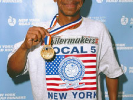 L-5 journeyman Francisco Viafara, a native of Venezuela, shows off his medal after completing the ING New York City Marathon last November.