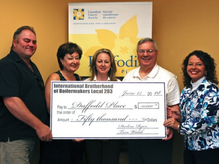 Local 203 officers and staff present a $50,000 check to Rose Daley (far right) of the Daffodil Place Campaign. L. to r., BM-ST Tom Walsh, Darlene Ryan, Heather Greely, and Pres. Bill Healey.