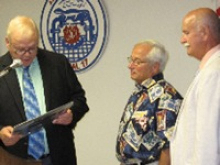 Thirty-five-year member Roy S. DiNovo Jr. (ctr.) receives an award from L-1 BM-ST John Skermont (l.) and Pres. John Benz, as he retires from the office of lodge inspector.