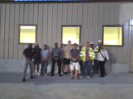 Workers and Boilermaker organizers celebrate a win to unionize at Ash Grove Cement in Midlothian, Texas.