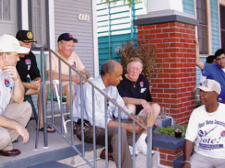 Grass-root efforts like this casual porch meeting help spread the message about the importance of voting and getting to know your candidate.