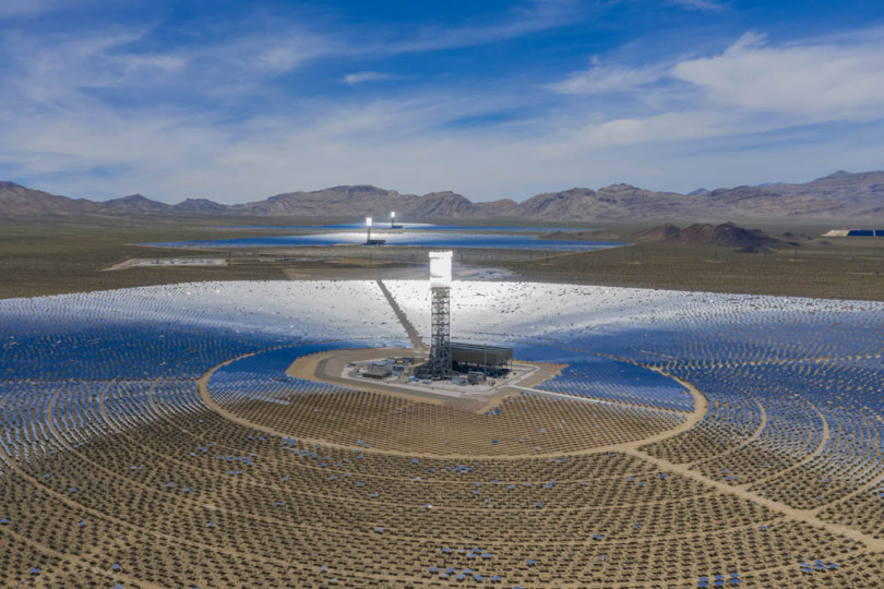 An array of mirrors, pointed skyward during installation, are a fraction of the 173,000 heliostats on the project site at the Ivanpah Solar Electric Generating System.