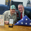 Retired Boilermaker James Banford (left) receives a Congressional Gold Medal from Pennsylvania Congressman Brian Fitzpatrick for his service as one of Merrill’s Marauders in World War II. 